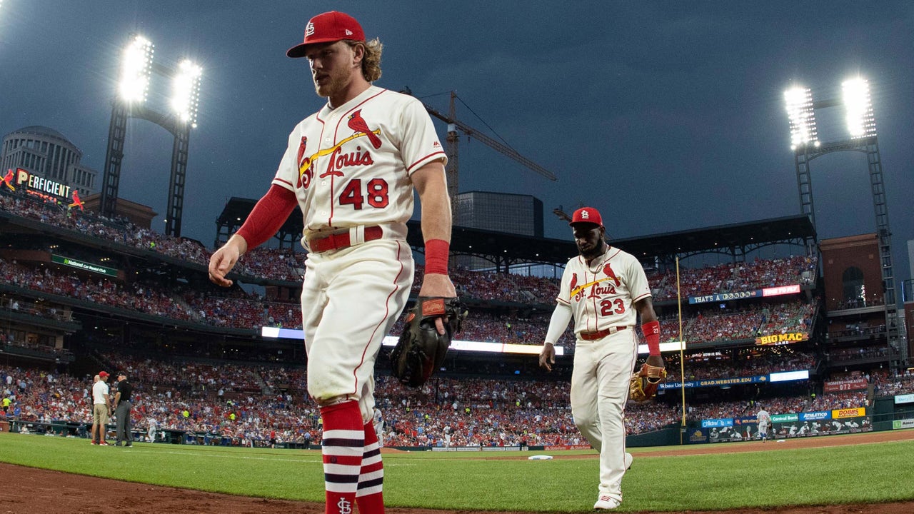 Cardinals wait out hours-long rain delay, top Cubs 7-4